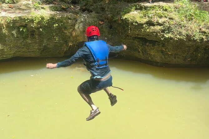 Adventure Half Day Explore Cueva Charco Azul and Cueva Arenales - Blue Puddle Caves: optional jump, waterfall, and limestone forms