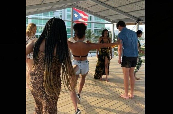 Learn Salsa in San Juan - Vivid beginner lesson - The included drink and sunset views: the payoff moment