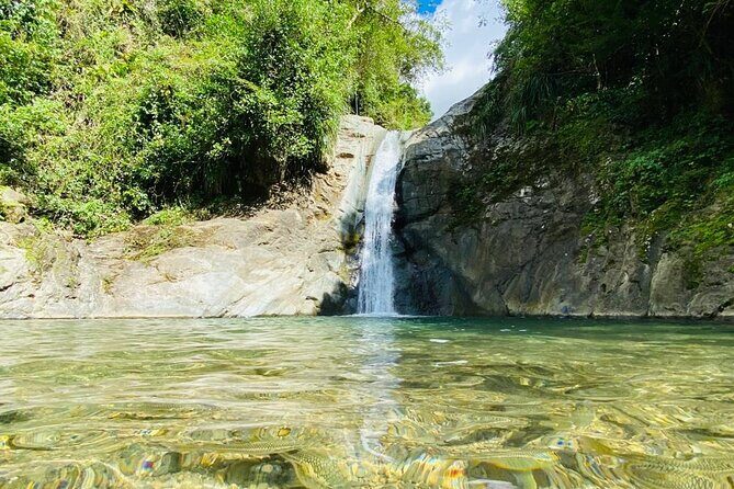 Private Wellness Tour of Puerto Rico Waterfalls and Hot Springs - Catarata Salto de Colores: Rio Guayo swim, hike, and photo time